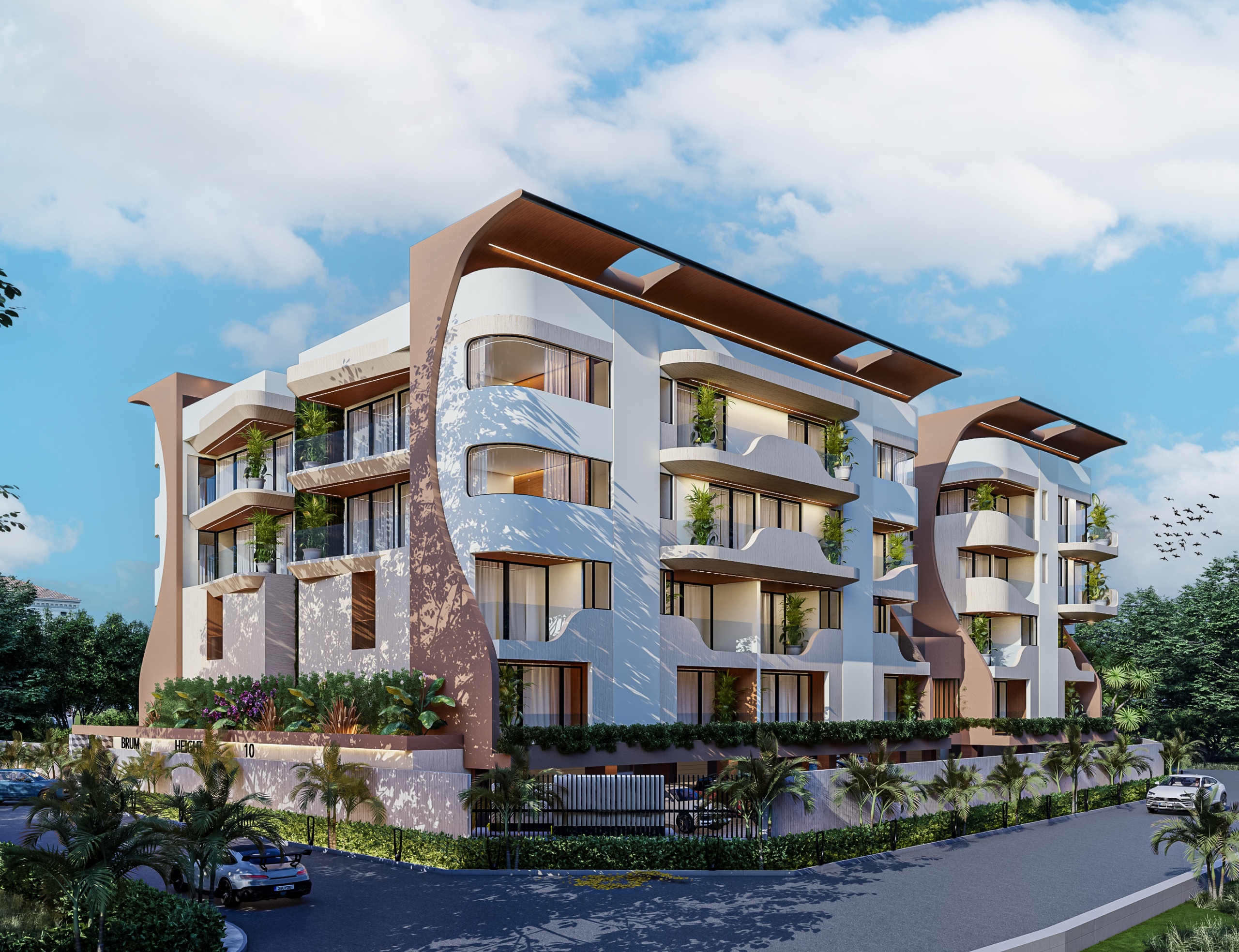 Modern white apartment building with curved brown canopies on balconies under a bright blue sky and scattered clouds.