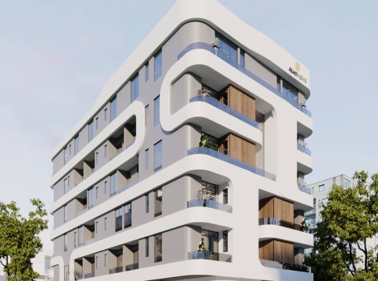 Rendering of a modern white apartment building with rounded corners and curved balconies.