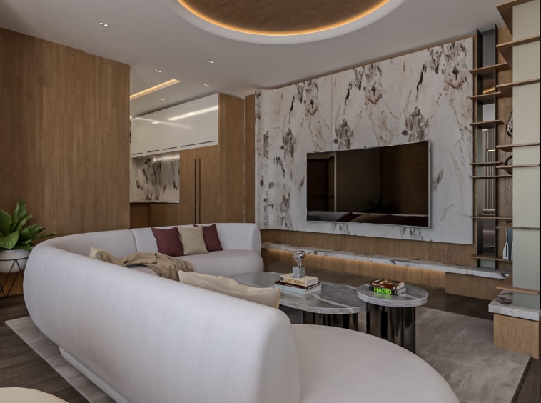 Modern living room with curved white sofa, marble wall TV mount, circular ceiling light, and wooden panels.