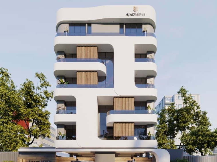 Modern white residential building with rounded balconies and wooden screens, car parked at the entrance.