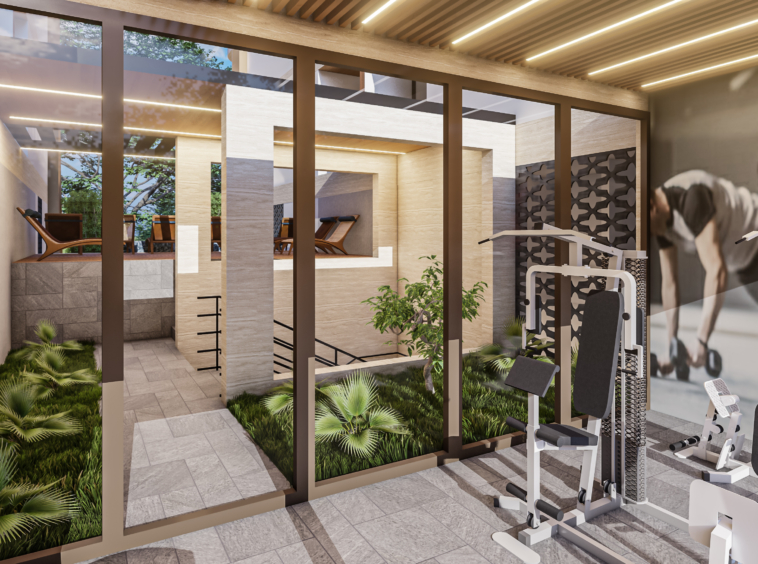 Modern gym interior with glass walls, cardio and strength machines, and greenery visible outside the windows.